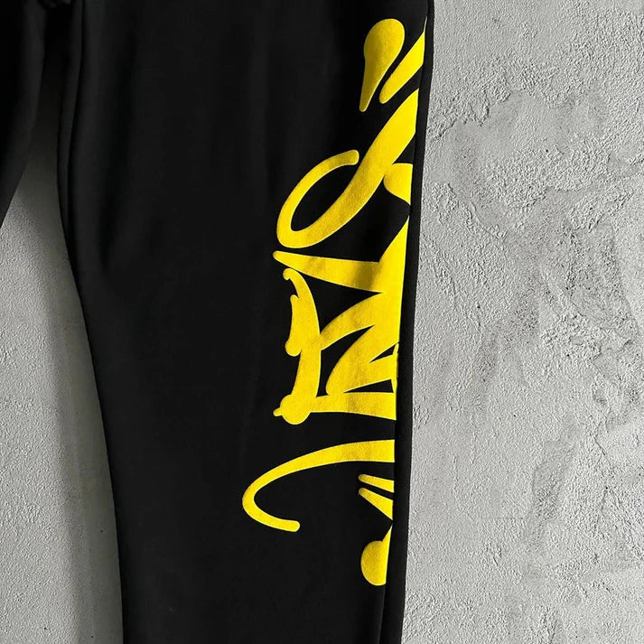Syna World "TEAM SYNA" Tracksuit [Marl Yellow/Black]